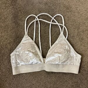 a PINK bralette, never worn but has tag off, size medium fits well/ soft
